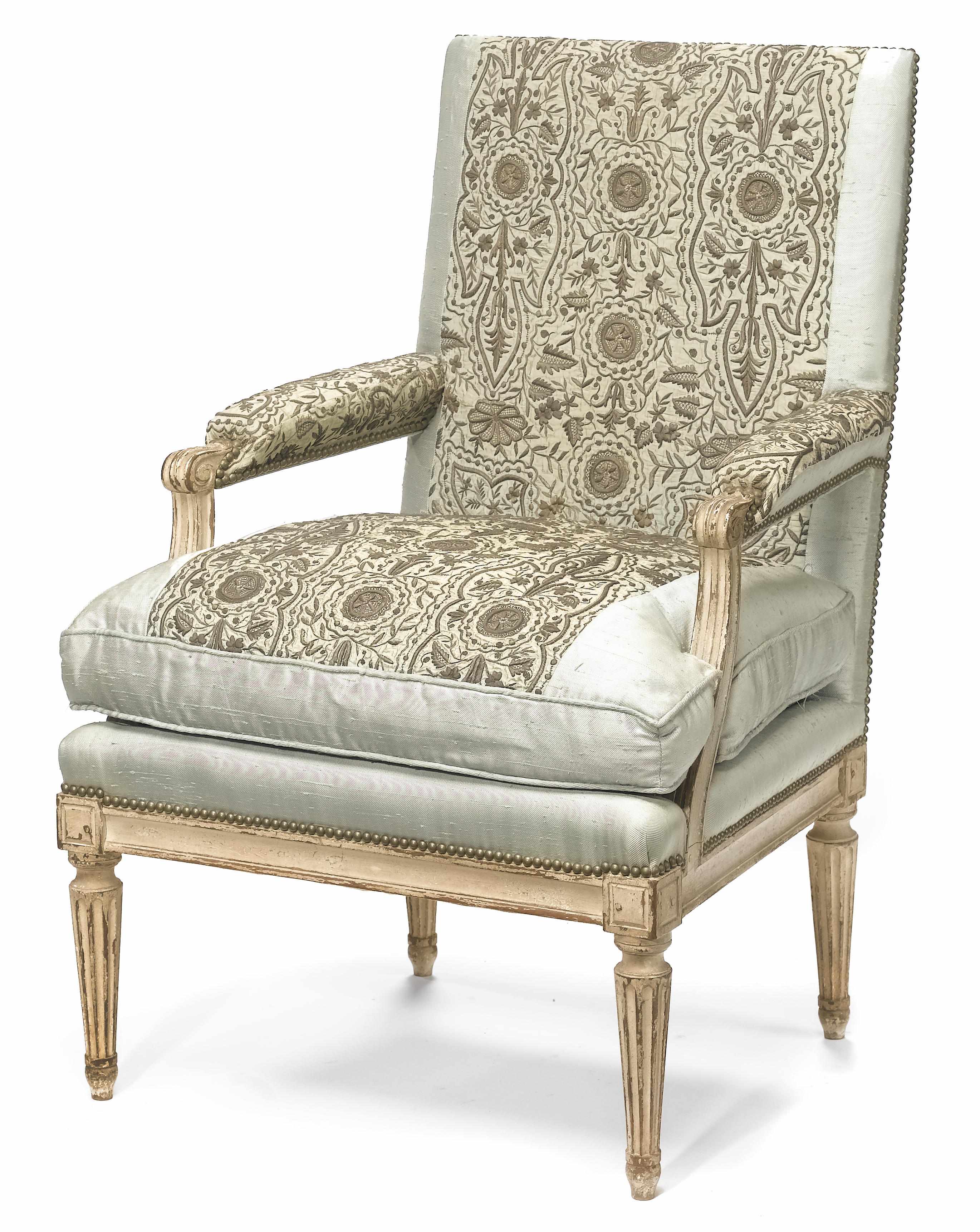 Appraisal: A Louis XVI style paint decorated fauteuil th century With