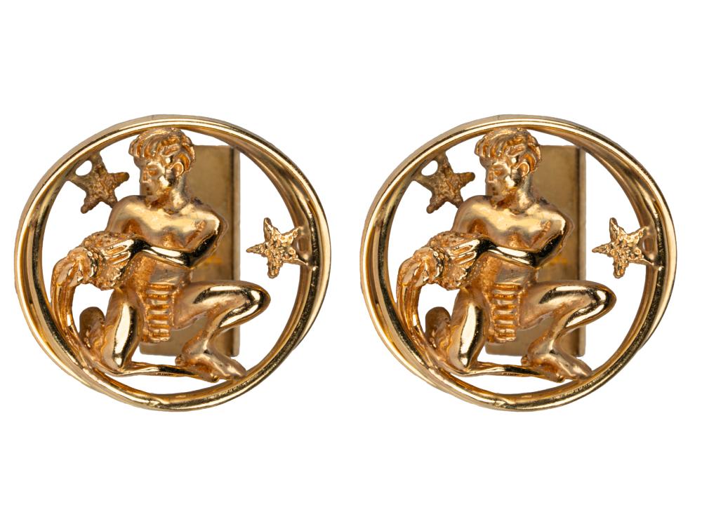 Appraisal: PAIR OF RUSER KARAT YELLOW GOLD ZODIAC CUFFLINKSdepicting the Aquarius