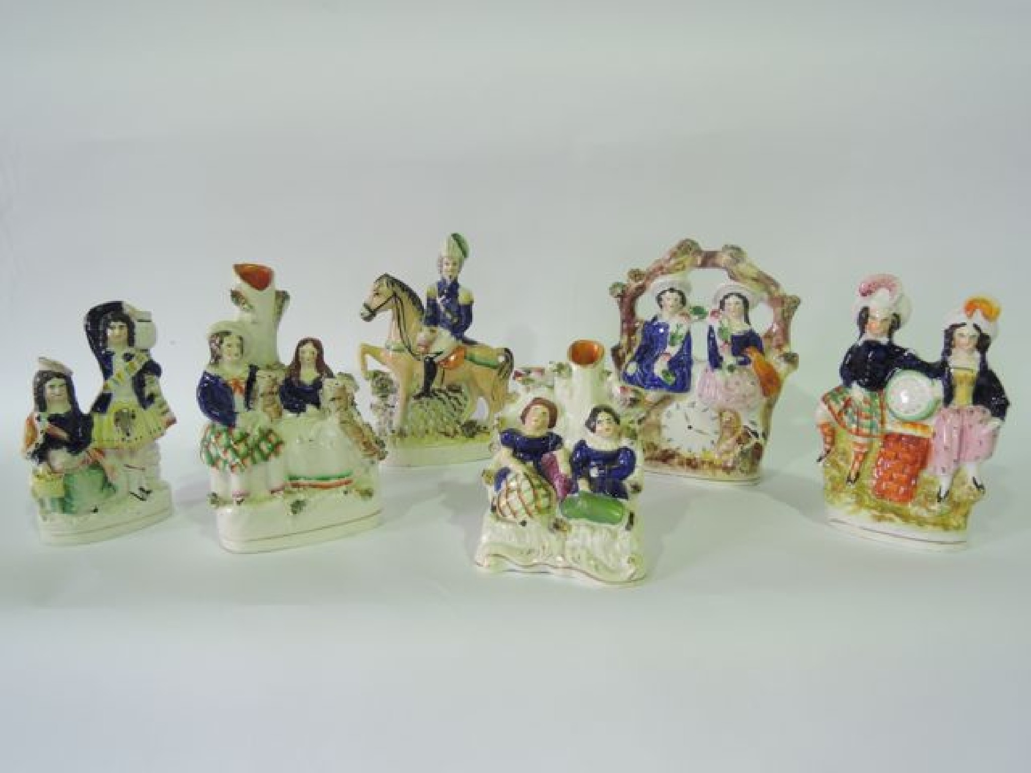 Appraisal: A collection of five th century Staffordshire figure groups including