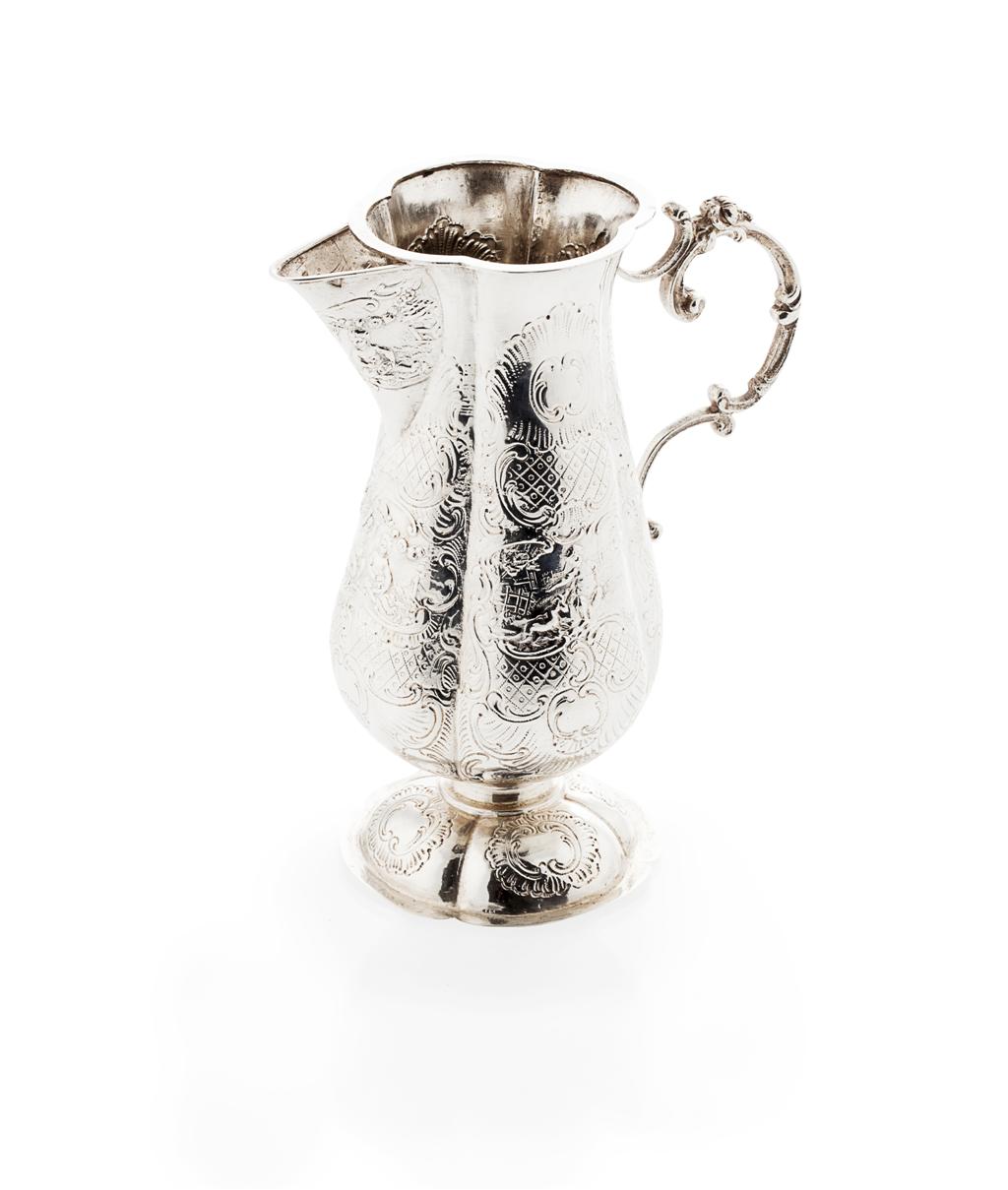 Appraisal: A Dutch silver cream jug circa of tall form lobed