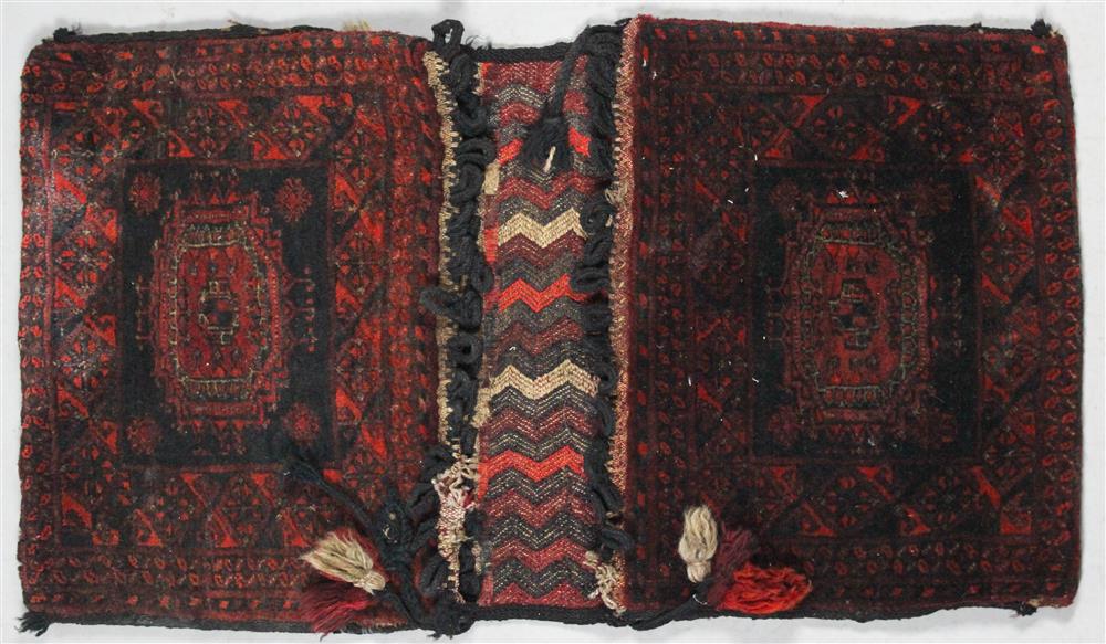 Appraisal: MIDDLE EASTERN WOOL CAMEL SADDLEBAG of typical construction with two