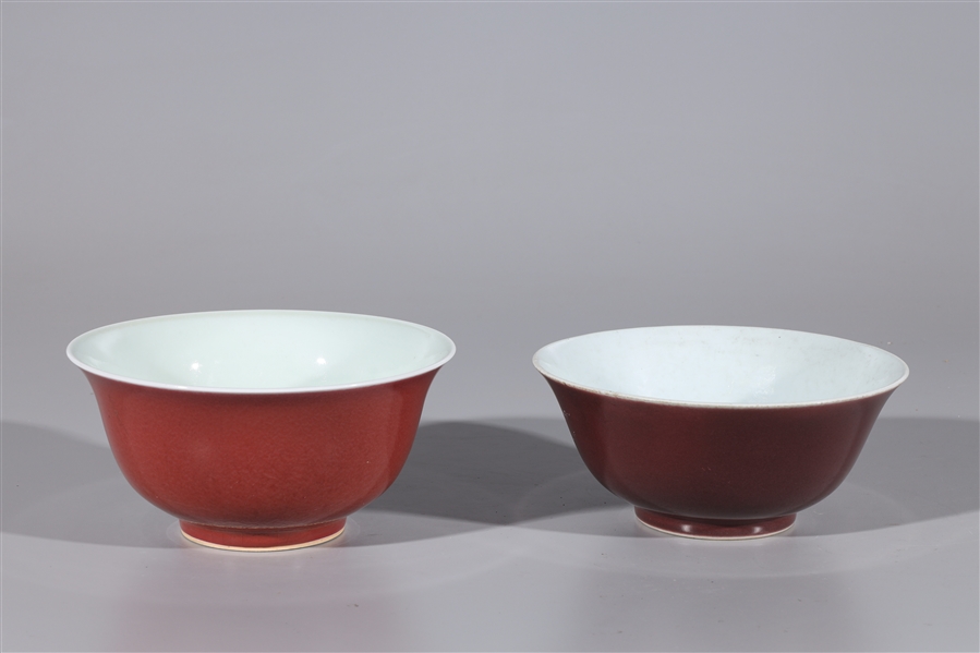 Appraisal: Two Chinese sang de boeuf porcelain bowls the larger H