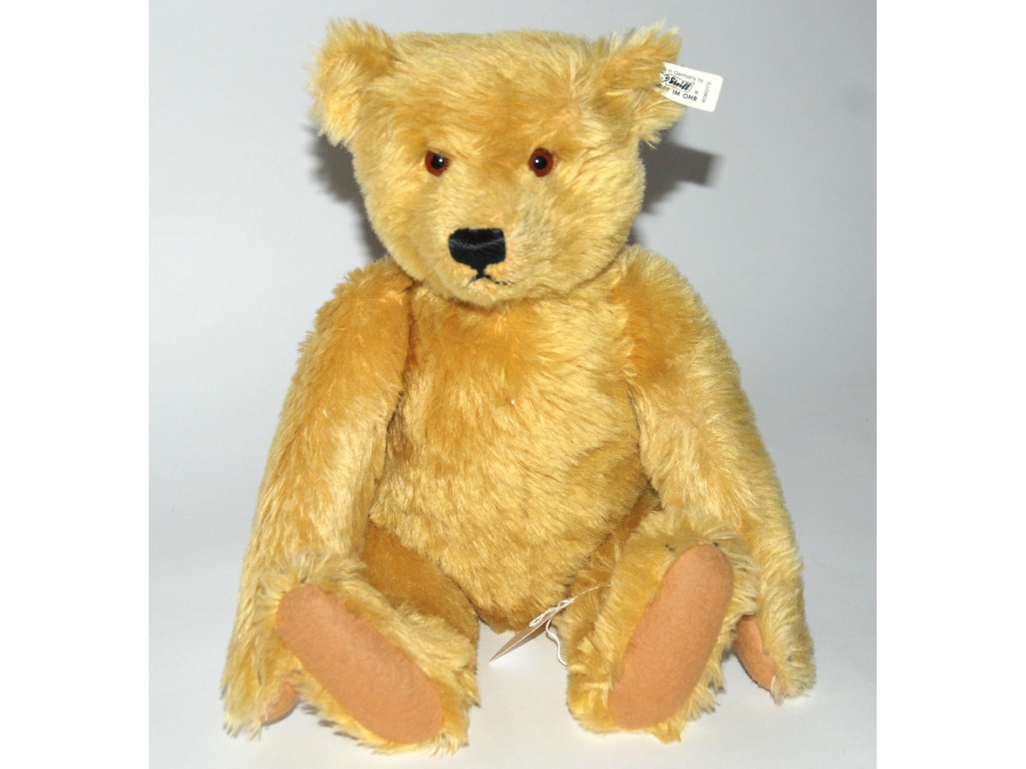 Appraisal: A modern Steiff teddy bear Blond in original box with