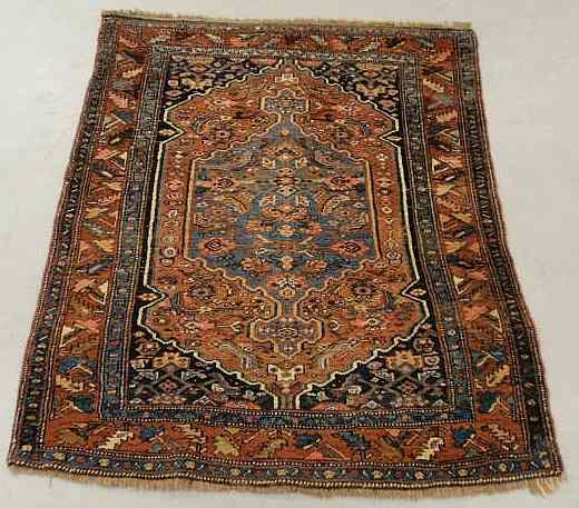 Appraisal: Persian oriental mat with overall red field and blue center