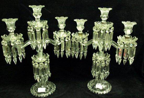 Appraisal: A pair th Century three-branch candleabra each flowerhead sconce above