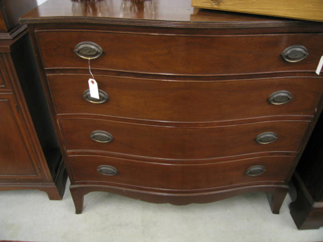 Appraisal: Mahogany Serpentine Chest four drawer