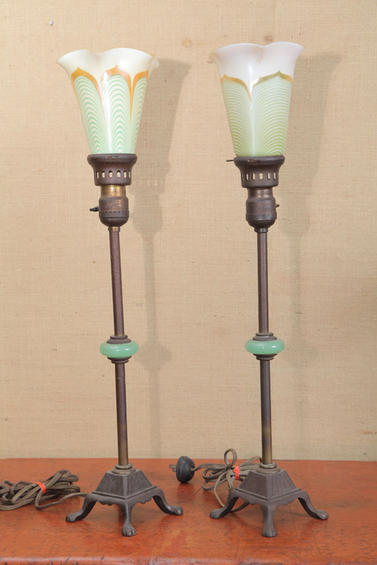 Appraisal: PAIR OF ART DECO LAMPS Cast iron bases and circular