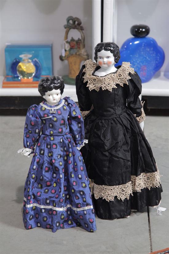 Appraisal: TWO CHINA HEAD DOLLS Jenny Lind style Each with black