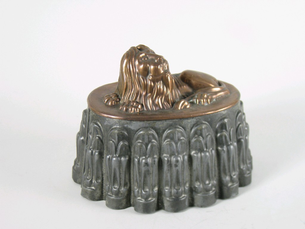 Appraisal: A copper 'Lion' Jelly Mould with oval metal base in