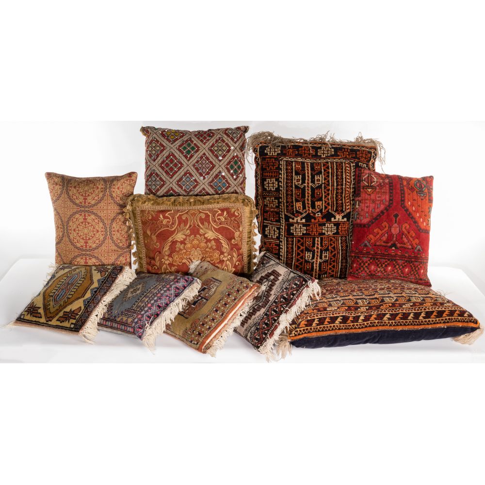 Appraisal: RUG PILLOW ASSORTMENT pillows having rug rug remnants on at