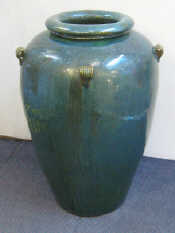 Appraisal: A very large turquoise glazed pot with five rope lugs