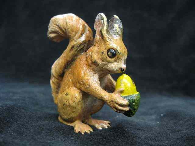 Appraisal: Austrian Bronze Miniature of a Squirrel cold painted holding an