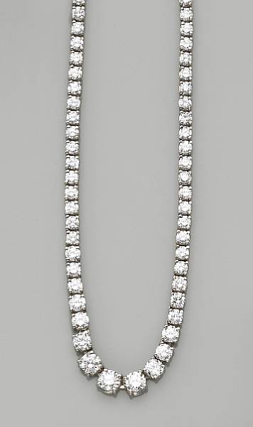 Appraisal: A diamond and platinum riviere necklace set throughout with graduated