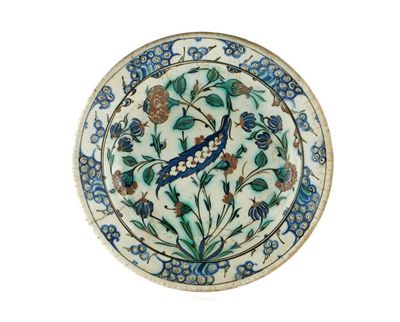 Appraisal: An Iznik pottery dish painted with a central saz leaf