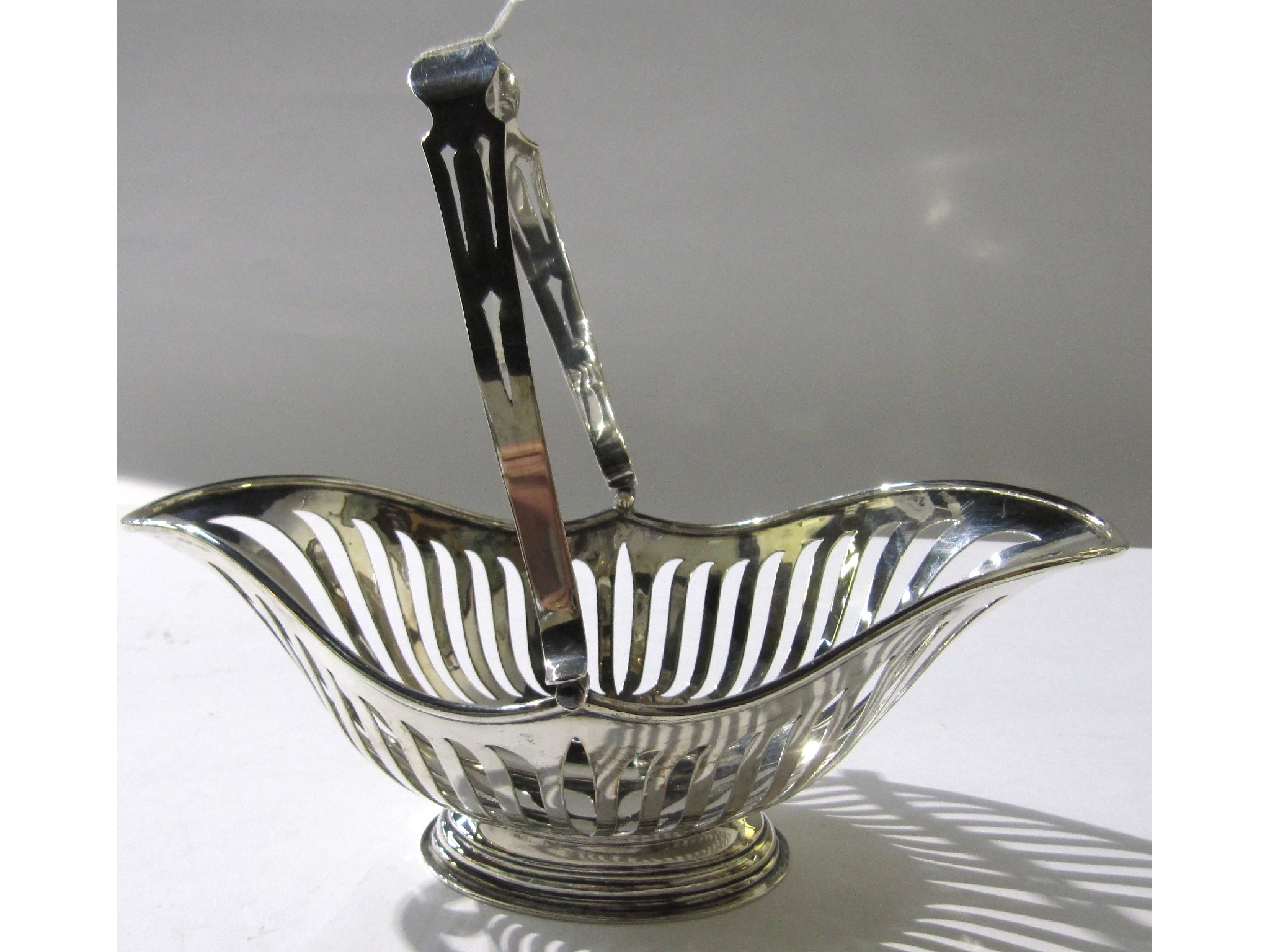 Appraisal: A silver swing handled basket Sheffield