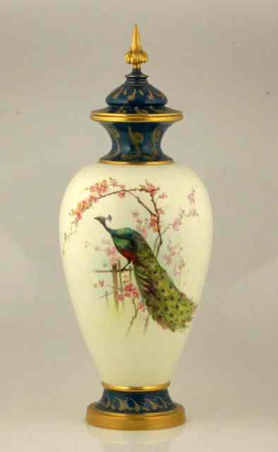 Appraisal: A Royal Worcester vase and cover finely painted a peacock