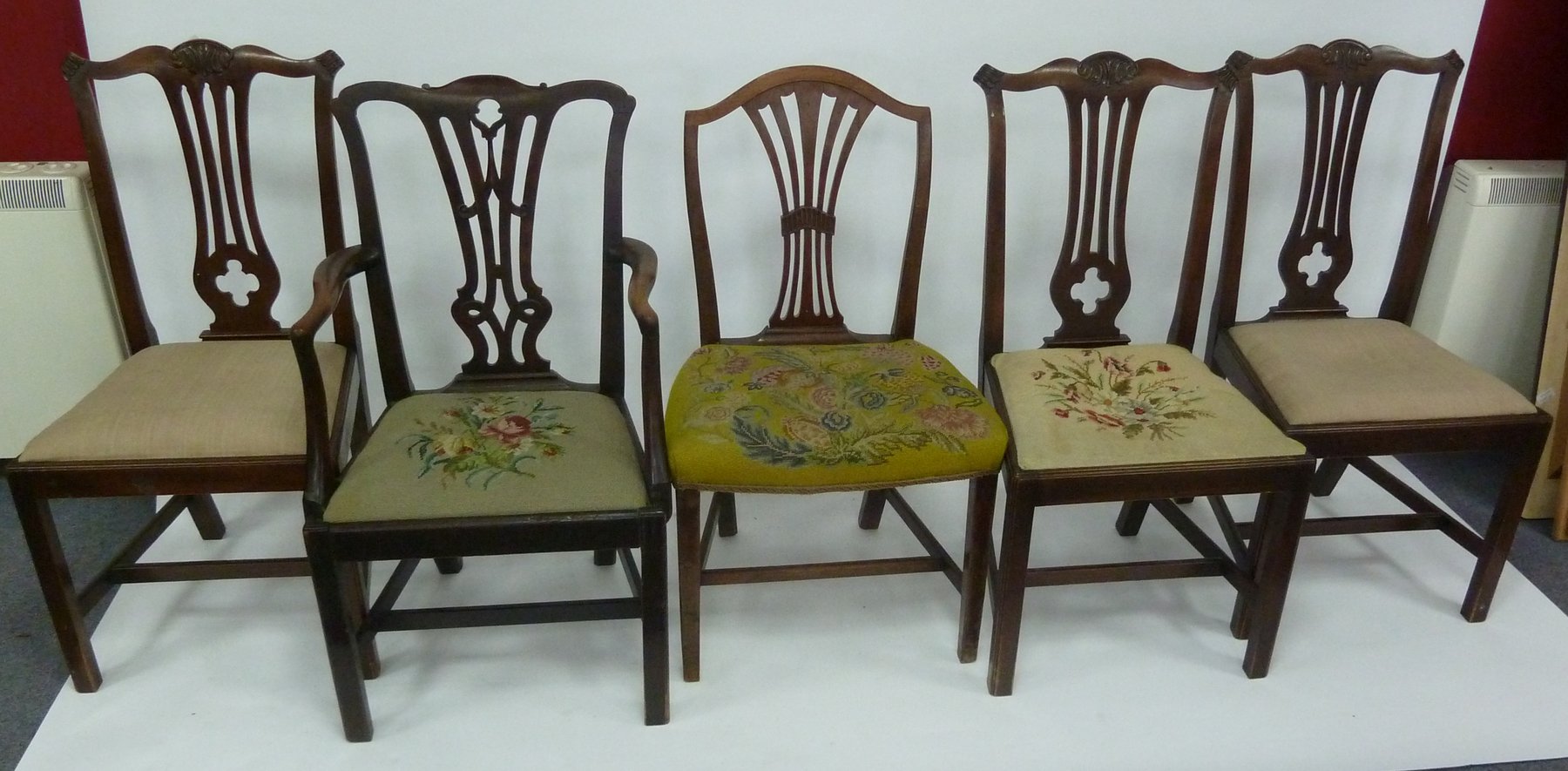 Appraisal: Three mahogany dining chairs with pierced upright splats to the