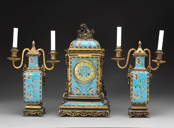 Appraisal: A French Chinoiserie champlev enamel gilt and patinated bronze three