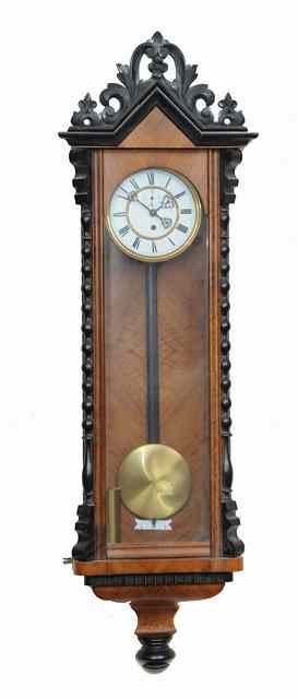 Appraisal: A VIENNA REGULATOR TYPE SINGLE WEIGHT WALL TIMEPIECE the two