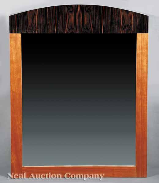 Appraisal: A Pair of Art Deco-Style Cherrywood and Rosewood Mirrors arched