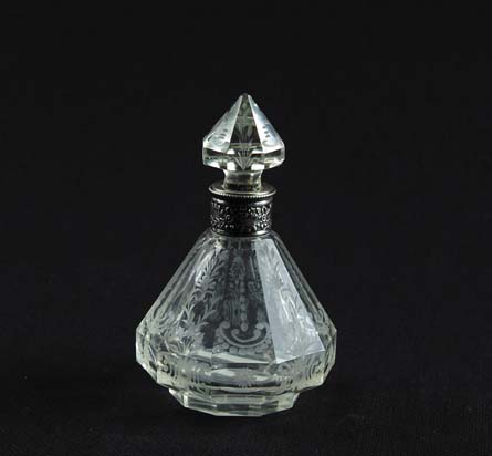 Appraisal: ETCHED GLASS STERLING COLOGNE Beautiful cologne bottle has ten faceted