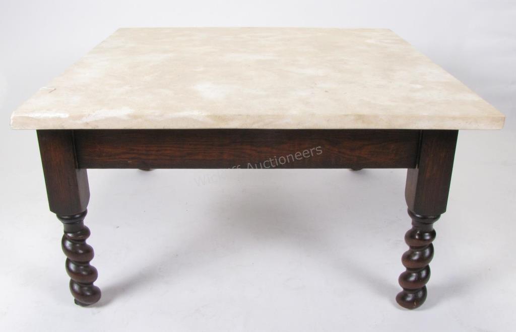 Appraisal: A vintage cocktail table with stone top wood base with