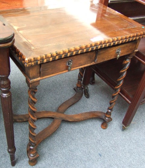 Appraisal: An early th century stained beech games table the fold