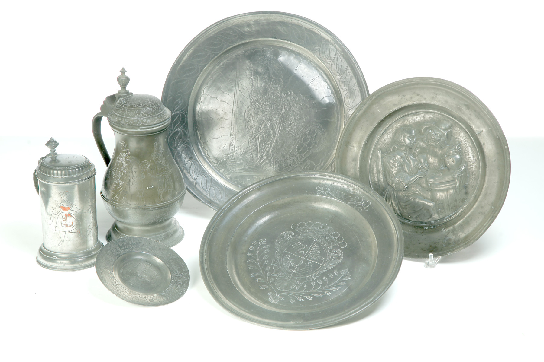 Appraisal: SIX PIECES OF EUROPEAN PEWTER WITH ENGRAVED OR EMBOSSED DECORATION