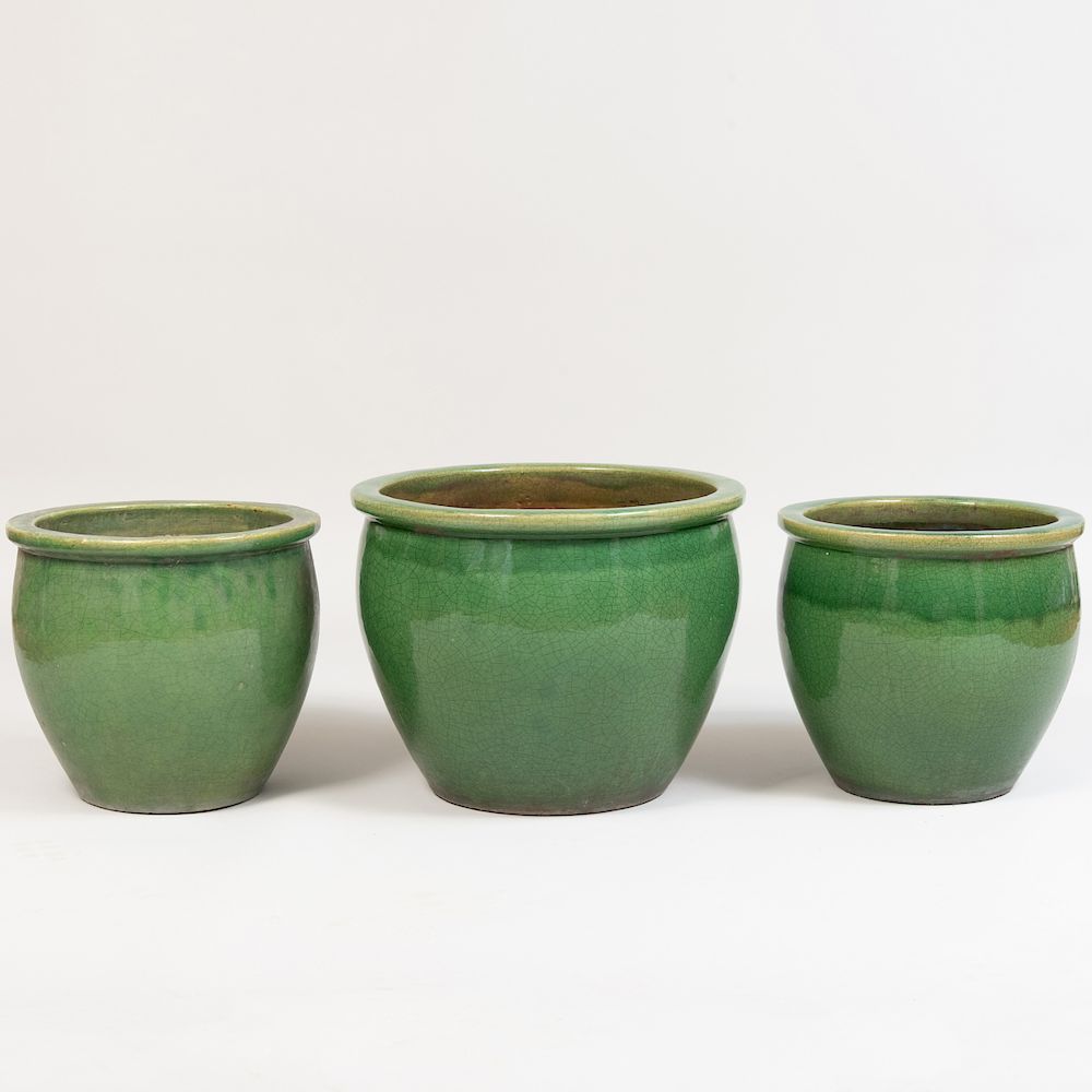 Appraisal: Group of Three Glazed Pottery Planters Comprising a single and