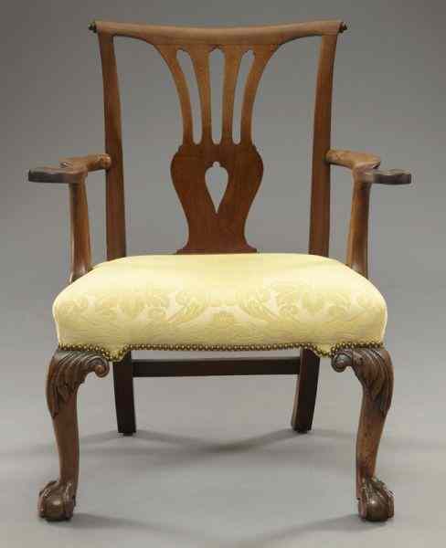 Appraisal: American Chippendale style arm chairwith a carved and pierced back