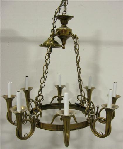 Appraisal: Eight light brass chandellier th century with buggle shaped light