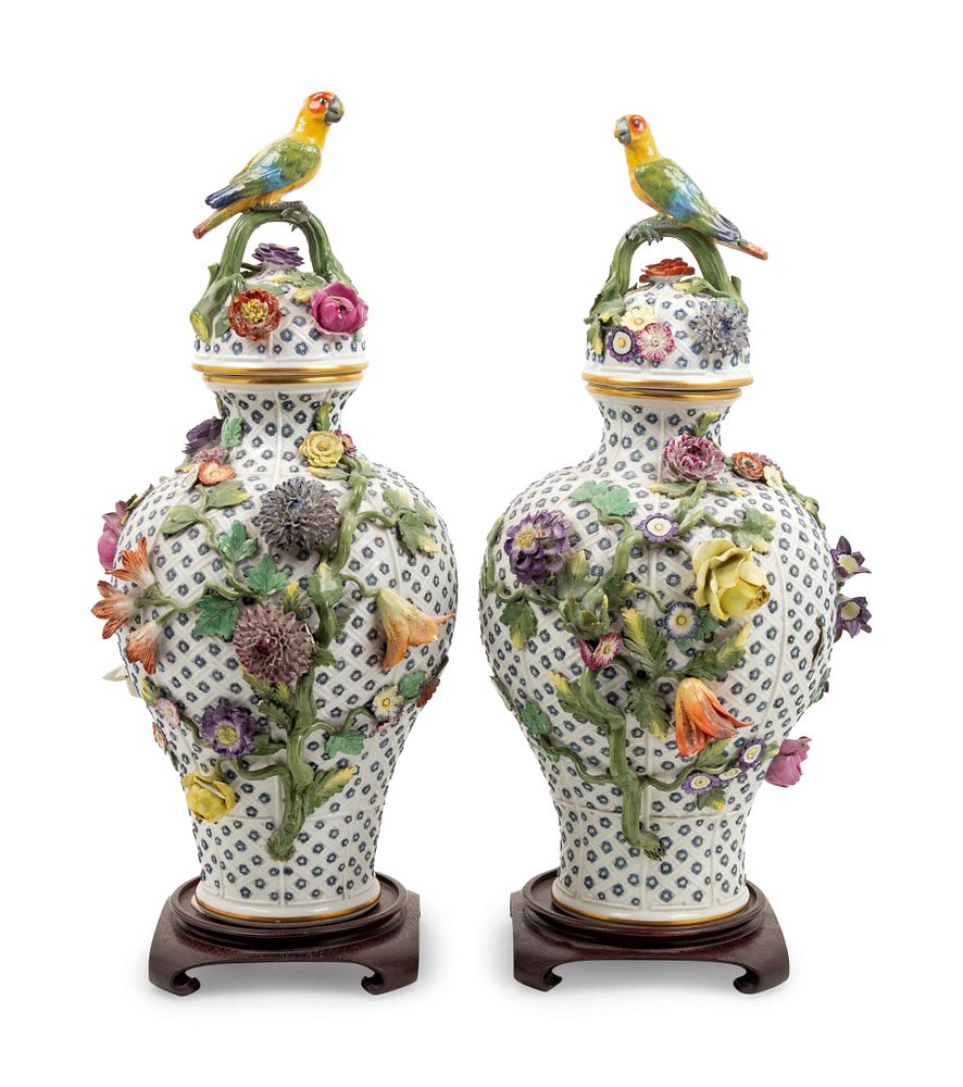 Appraisal: A Pair of Continental Porcelain Covered Urns A Pair of