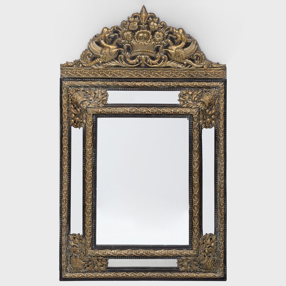 Appraisal: Dutch Baroque Style Brass Repouss and Ebonized Mirror The top