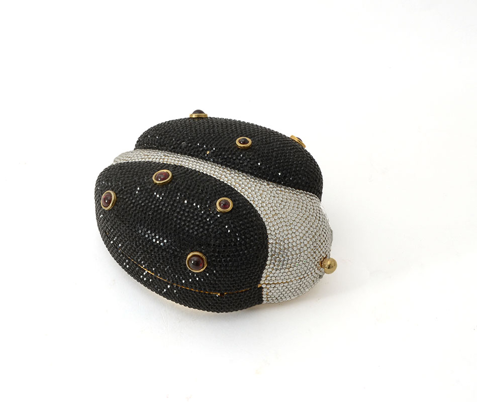 Appraisal: JUDITH LEIBER BLACK WHITE MINAUDIERE CLUTCH Crafted from black and