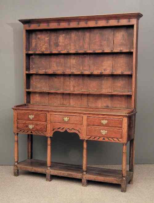 Appraisal: A late th early th Century oak dresser the upper