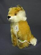 Appraisal: STEIFF FUCHS MINIATURE Setting Fox button in ear complete with