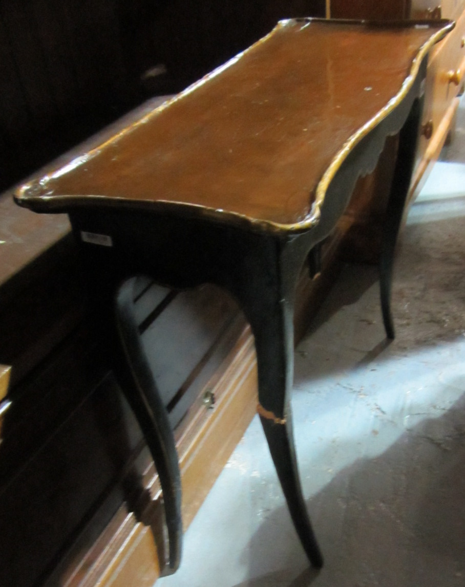 Appraisal: A th century ebonised side table a cream and gilt