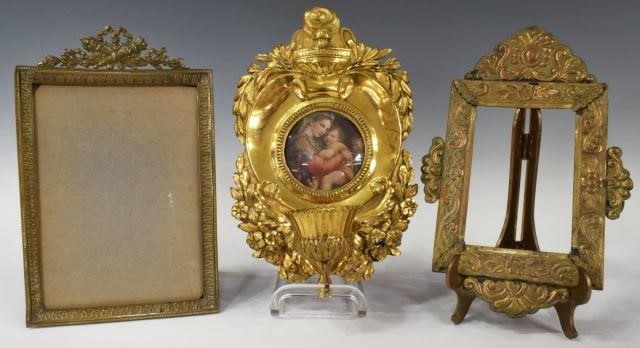 Appraisal: lot of Gilt metal frames including holy water font frame