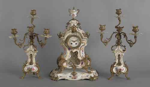 Appraisal: KPM ormolu mounted porcelain clock garniture late th c h