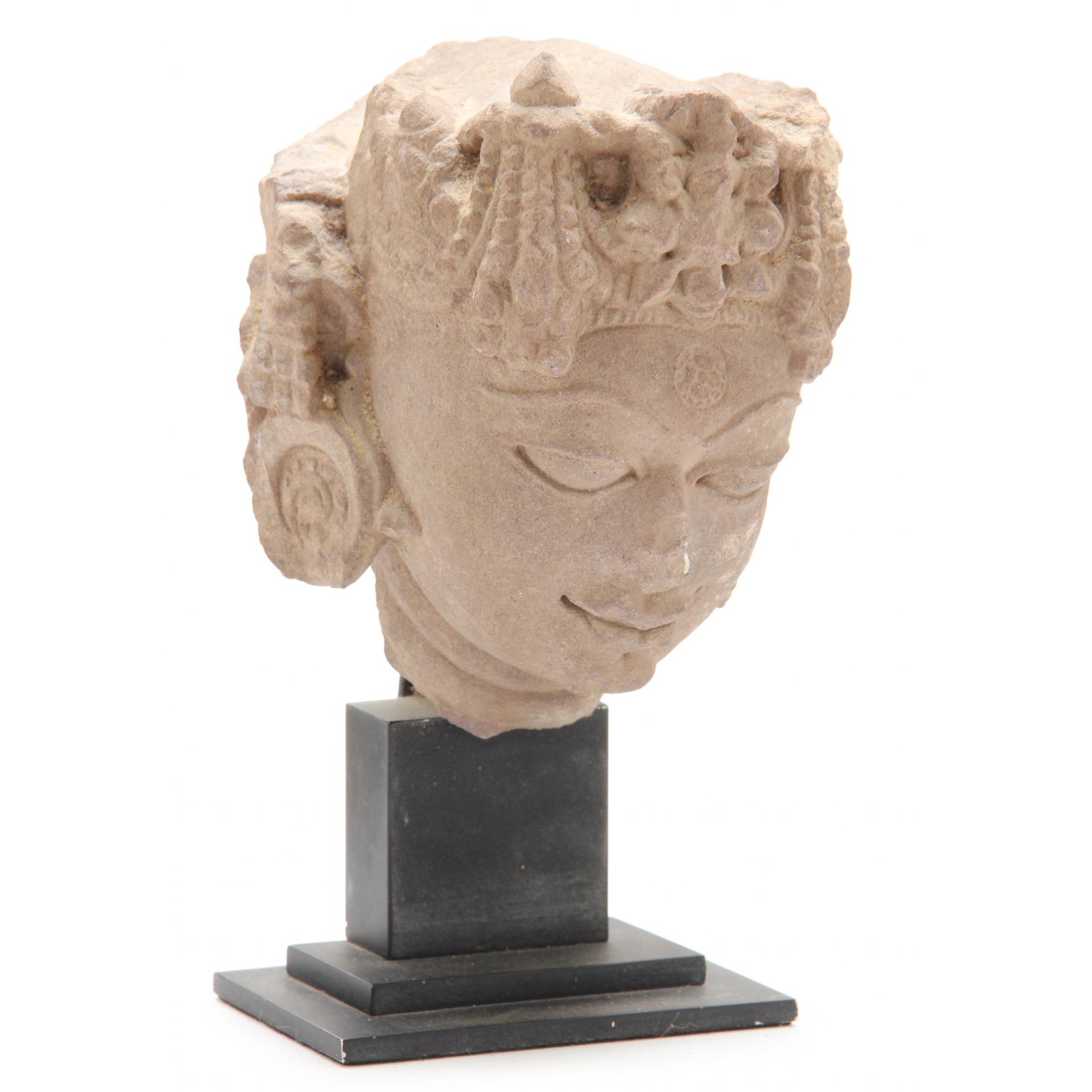 Appraisal: India Rajasthan Red Sandstone Head of a Deity th- th