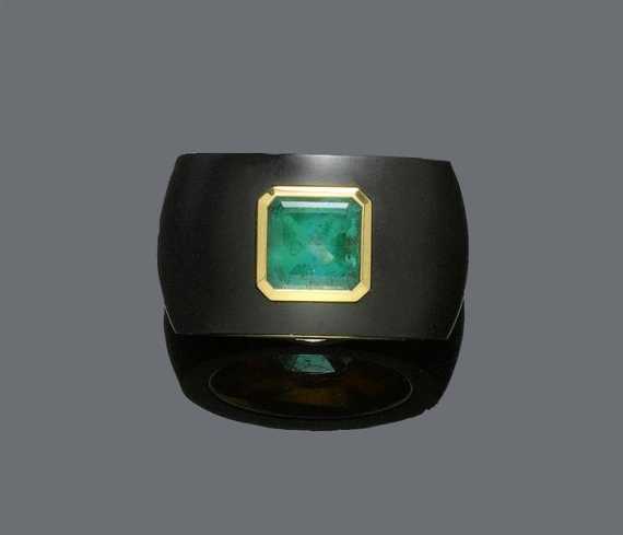 Appraisal: EMERALD AND JADEITE RING Pink gold Modern broad band ring