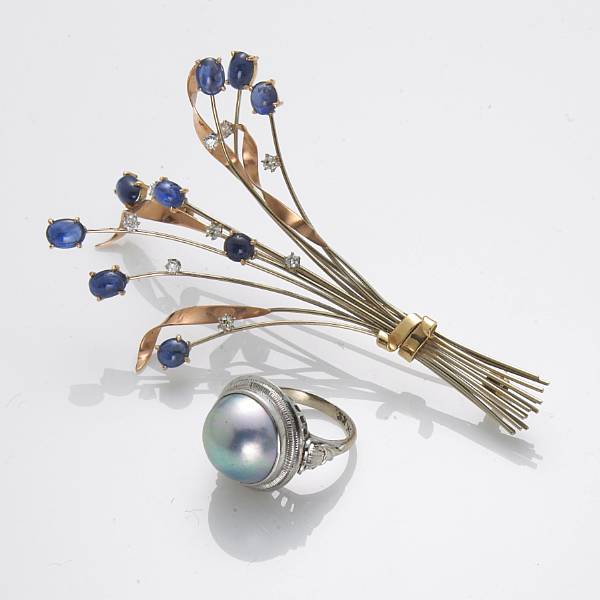 Appraisal: A sapphire diamond and k bicolor gold brooch together with