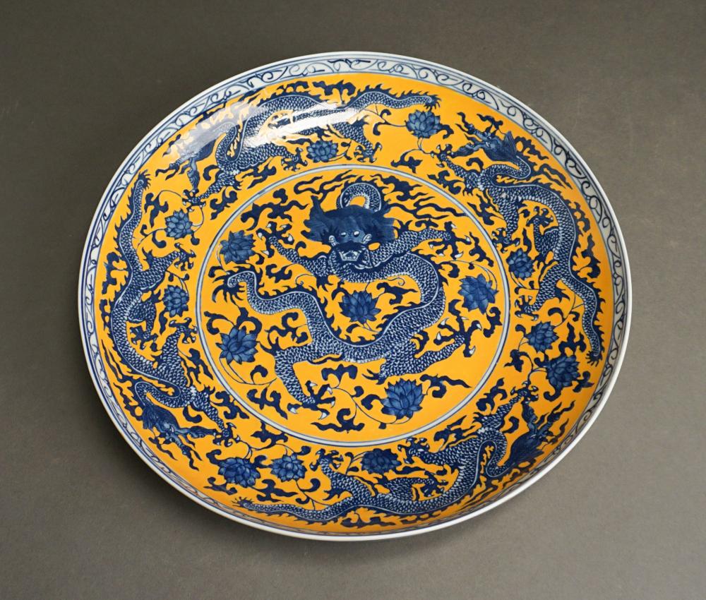 Appraisal: Chinese Blue and Yellow Porcelain Dragon Charger D in cm