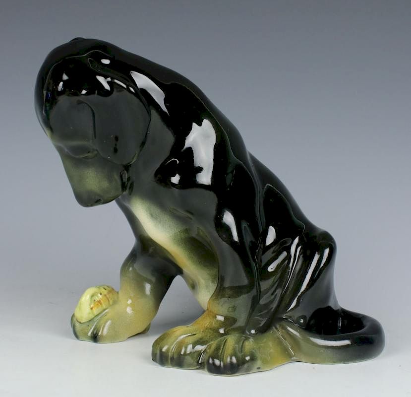 Appraisal: Wiener Werkstatte Figurine Dog Puppy with Caterpillar MANUFACTURE Wiener Werkstatte