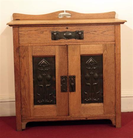 Appraisal: An Arts and Crafts style oak dresser the rectangular ledge