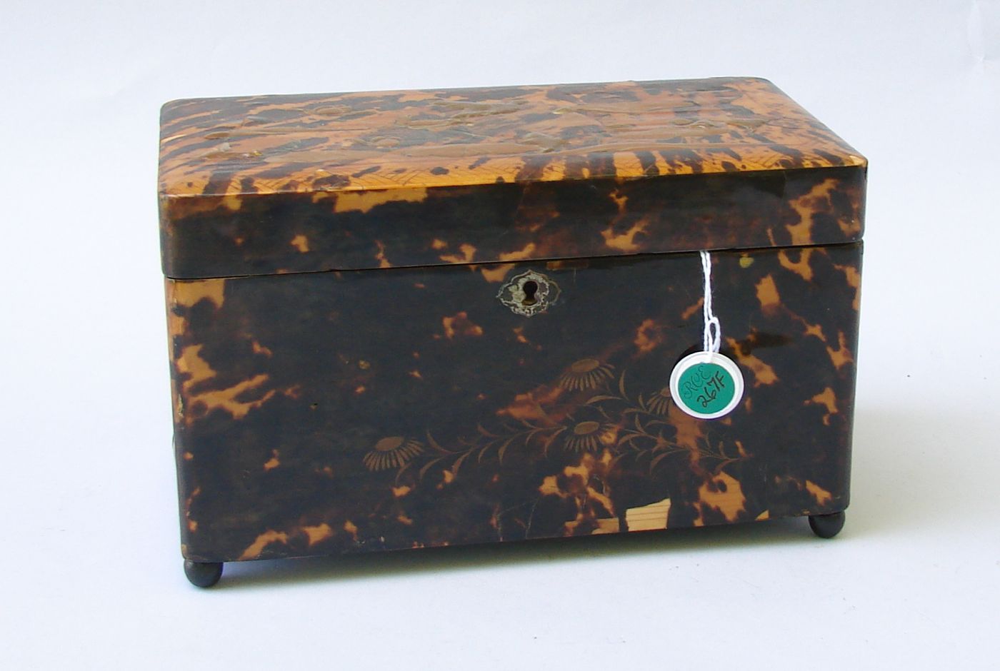 Appraisal: LACQUER ON TORTOISESHELL TWO-COMPARTMENT TEA CADDY th CenturyIn rectangular form