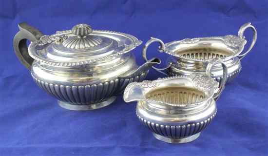 Appraisal: An Edwardian demi fluted silver three piece tea set of