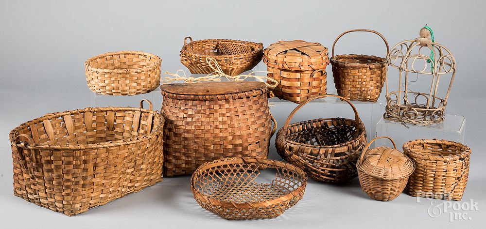 Appraisal: Collection of baskets to include a fishing creel Collection of