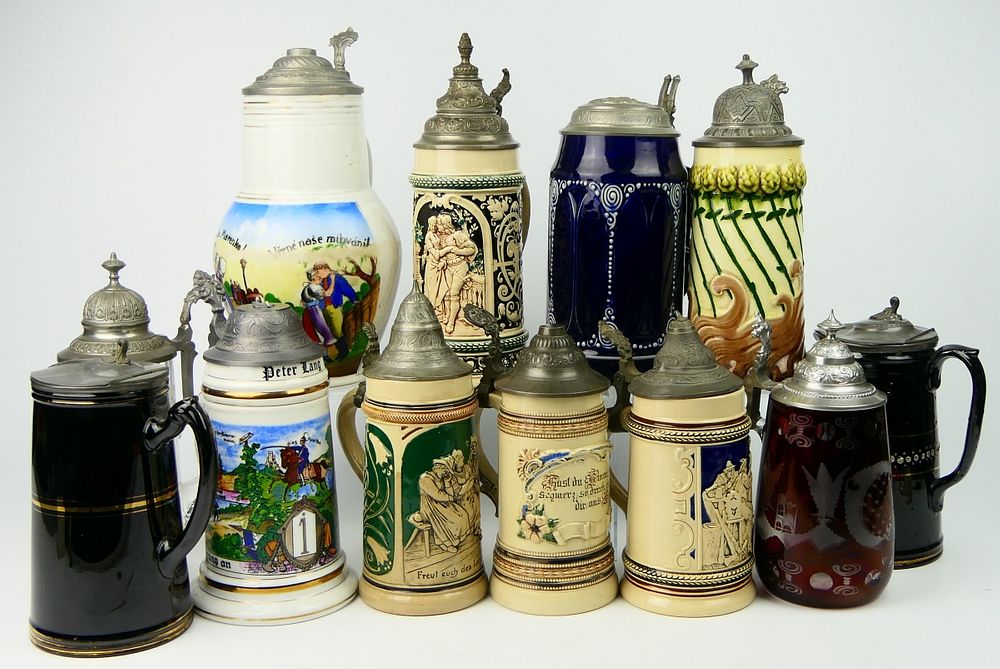 Appraisal: GROUPING OF VINTAGE GLASS PORCELAIN STEINS Tallest about from a