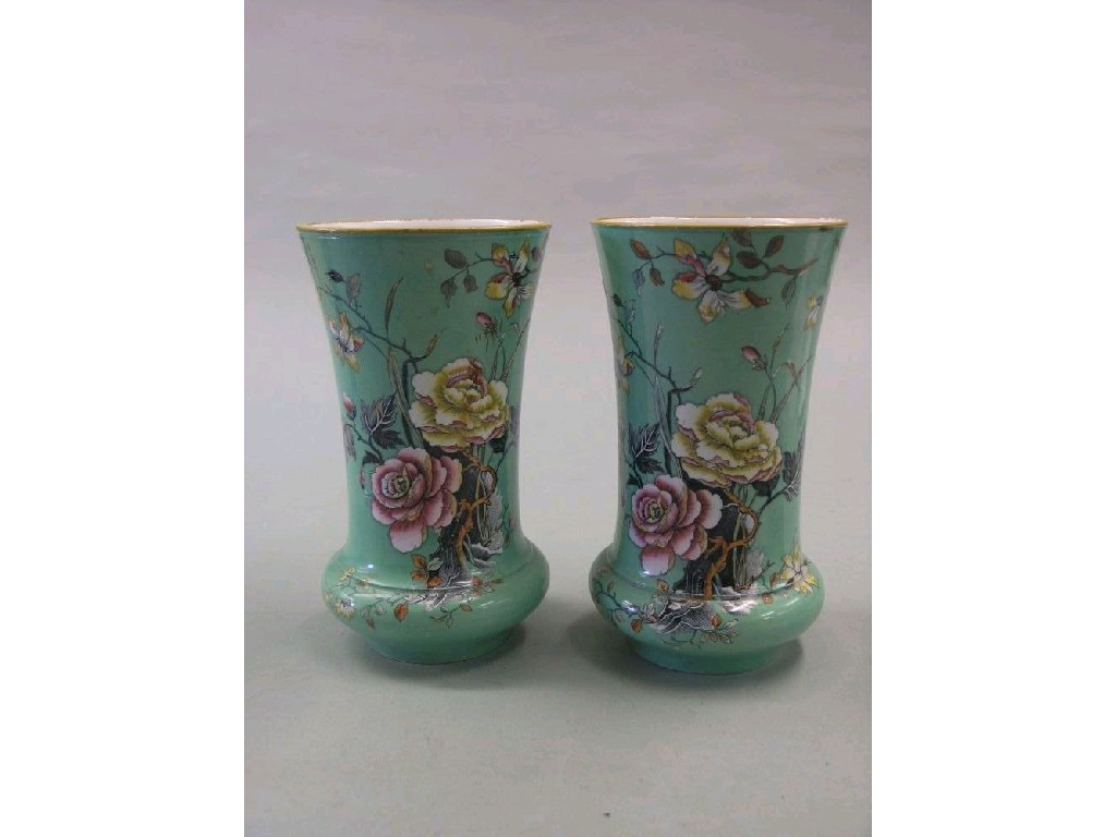 Appraisal: A pair of Henry Burgess Burslem earthenware vases printed and